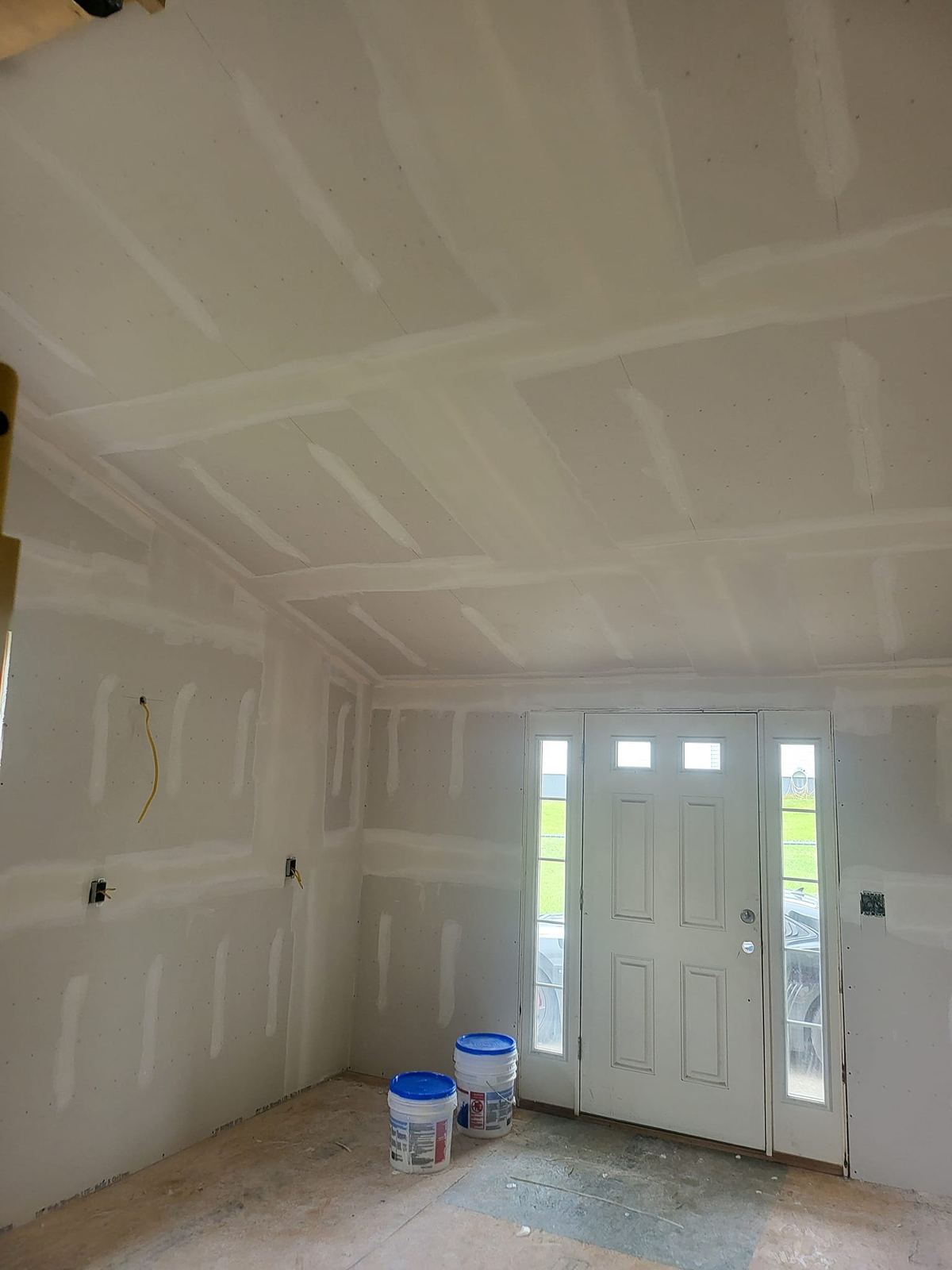 Drywall installation around entry